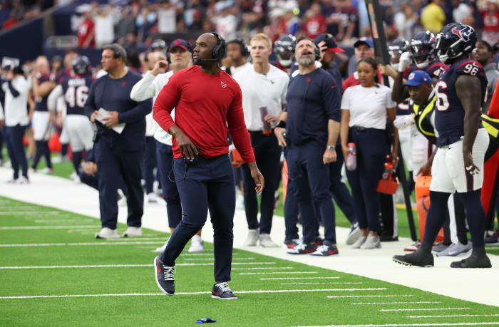 Texans head coach DeMeco Ryans throws the challenge flag on a play as the Texans play against the Tampa Bay Buccaneers in the fourth quarter at NRG Stadium.